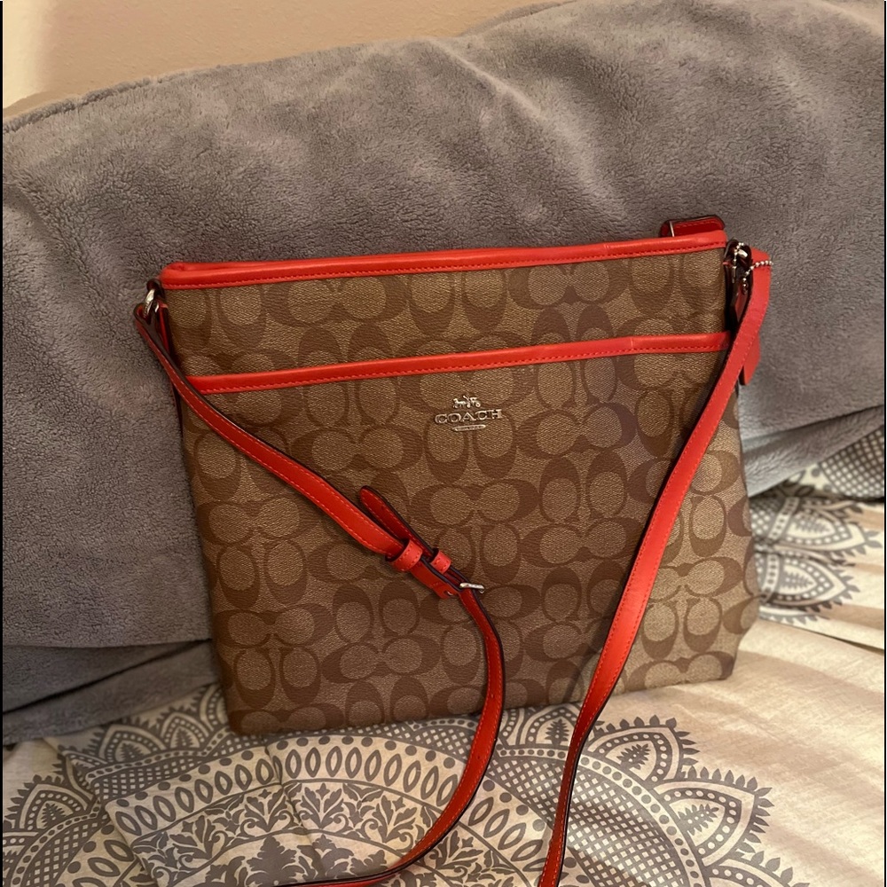 Coach crossbody orange color